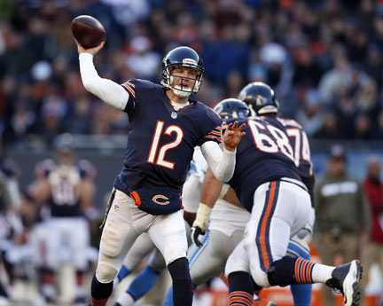 Quarterback Josh McCown of the Chicago Bears passes during a touchdown drive in the fourth quarter against the Detroit Lions at Soldier Field in Chicago, Sunday, Nov. 10, 2013. The Lions beat the Bears, 21-19.
