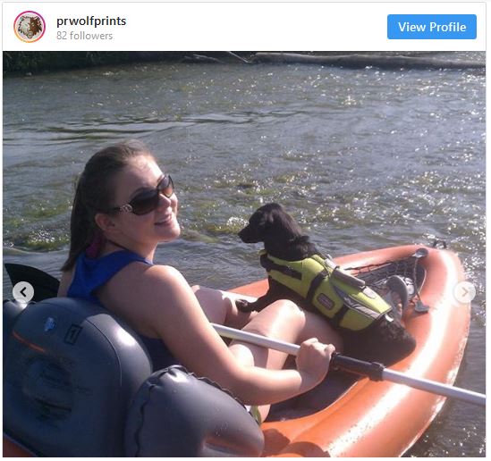 Mrs. Pham, pictured with her dog Bailey, teaches English at Prairie Ridge High School.