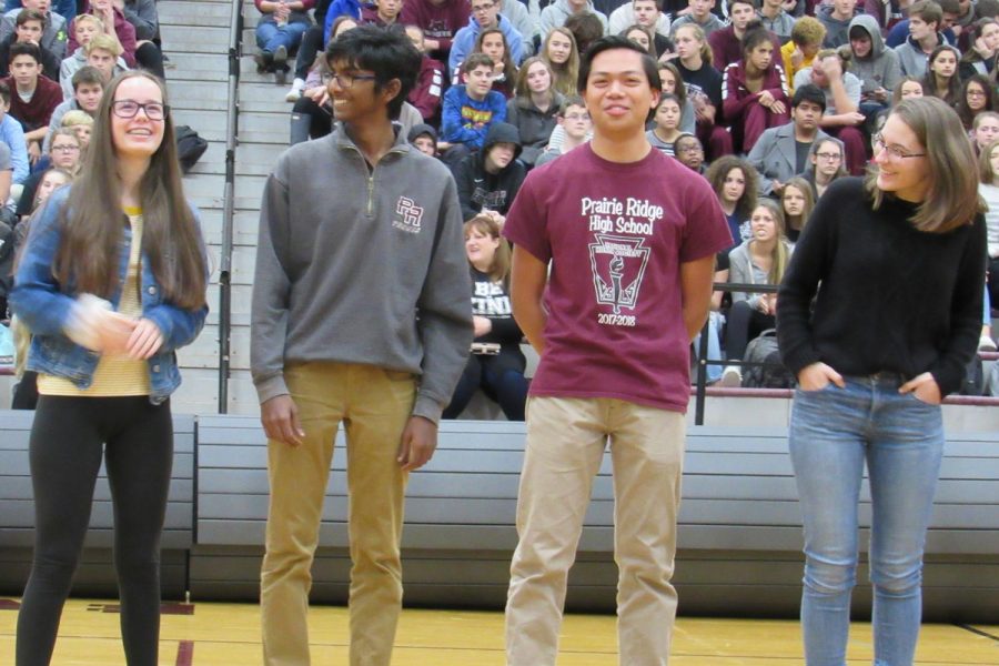 Members of the state champion Science Olympiad team smiled when they were recognized during the assembly on Friday, November 30, 2018.