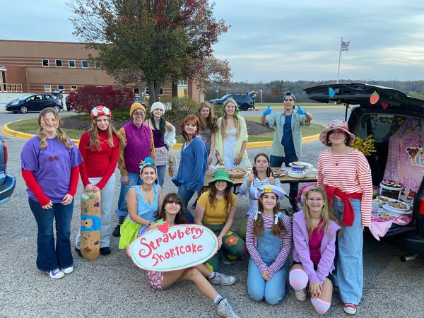 Members of the PR Color Guard dressed up as Strawberry Shortcake characters the night of the Wolfpack marching band Halloween event. Several students made parts of their costumes.