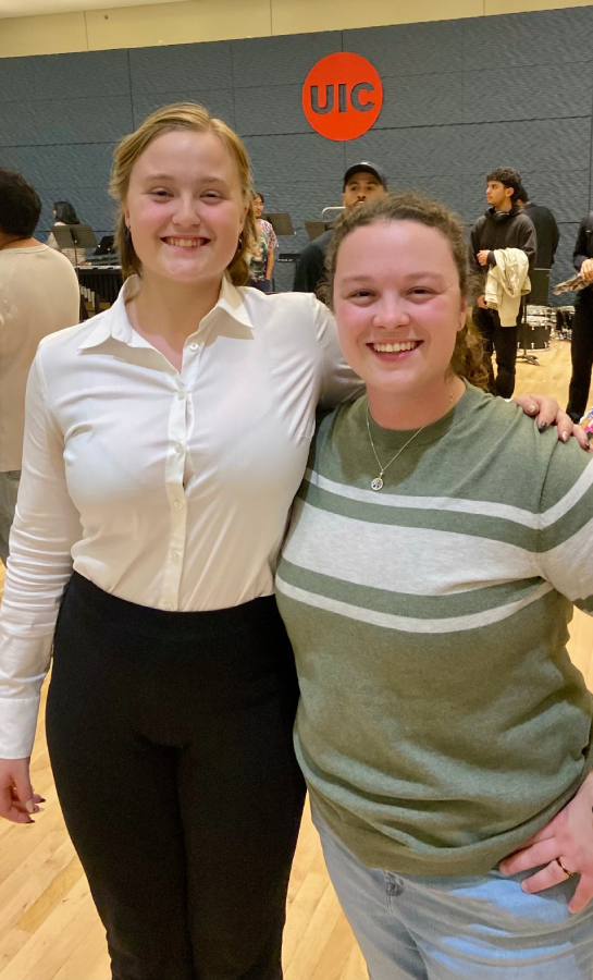 Ashton (left) poses with Prairie Ridge Director of Bands Marykate Kuhne.