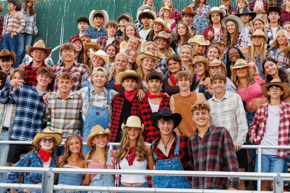 Superfans pose for a picture at the September 6, 2024 varsity football game vs. Crystal Lake South. Photo by David Farstead.