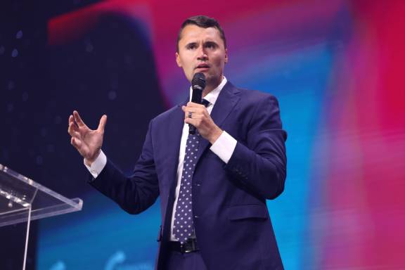 Charlie Kirk speaks with attendees at the 2025 Student Action Summit at the Tampa Convention Center in Tampa, Florida. Charlie Kirk (54669451482) by Gage Skidmore is licensed under Creative Commons Attribution-Share Alike 4.0 International license. 